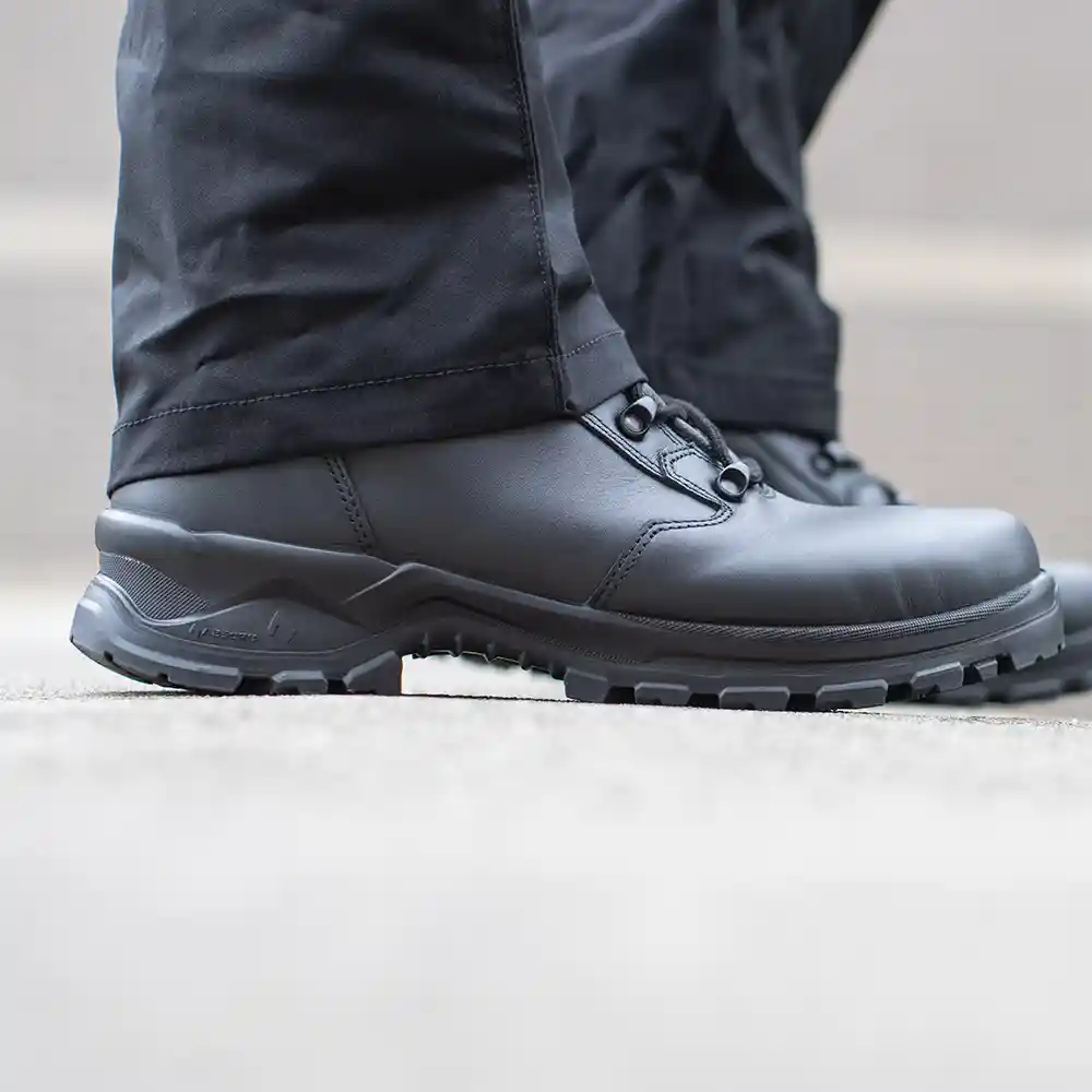 Close-up on durable bullhide leather of black Enforce X High Winter boots for a sleek look that meets uniform standards.