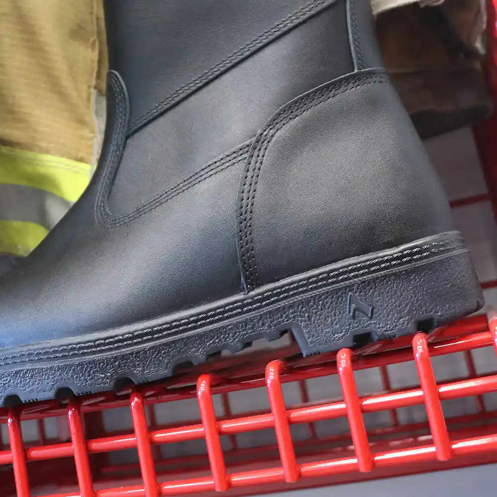 Close-up of black Fire Hunter USA leather fire boots material, featuring a better fit that surpasses rubber boots